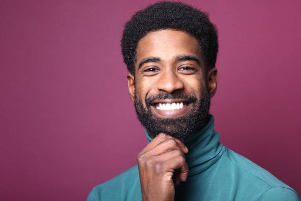 istock Beautiful black man in front of a colored background 1082487880