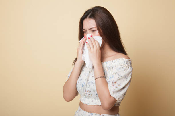 istock Young Asian woman got sick and flu. 1082488206