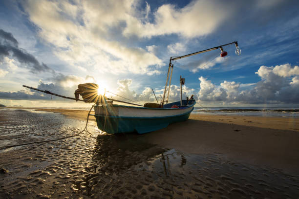 istock Long tail boat on sunrise scene 1082488886