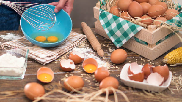 istock Organic egg whisk on wooden table 1082495544