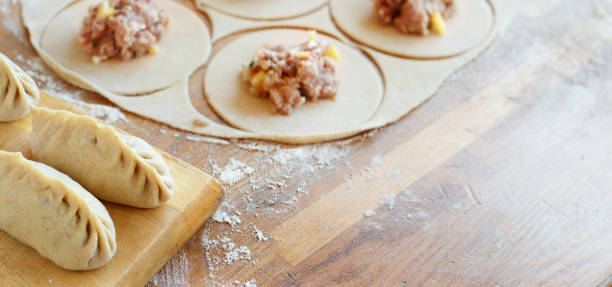 istock Preparation of dumplings manti 1082495612