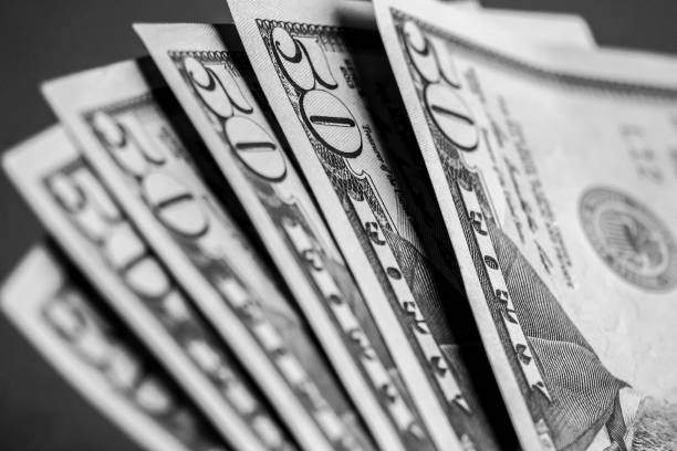 istock Closeup of fifty dollar banknotes. 1082496502