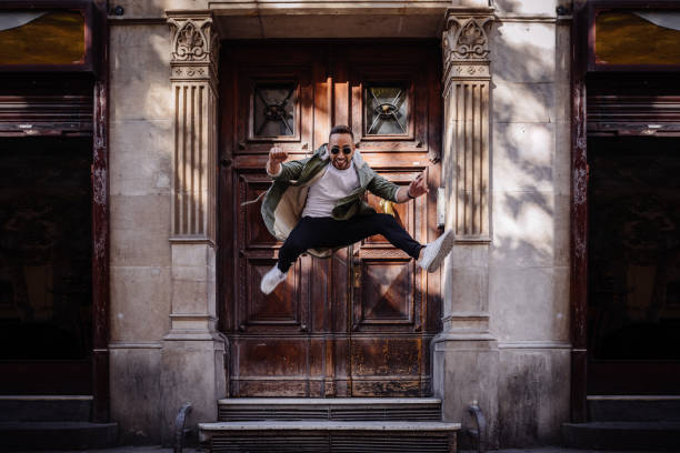 istock Young boy jumping on the street 1082496582