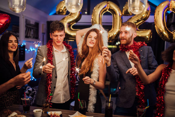 istock Young people celebrating New year 1082505110