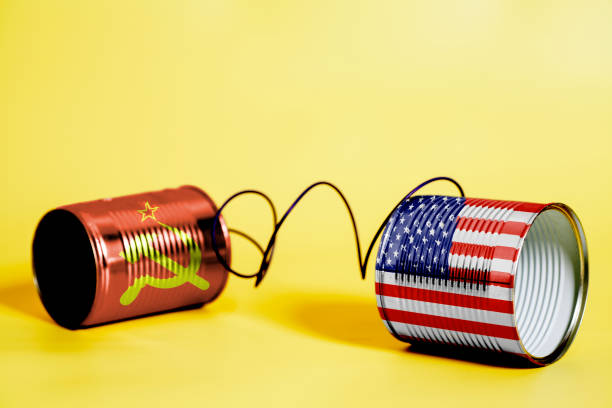 istock tin can phone with USA and Soviet Union Flags. communication concept 1082507430