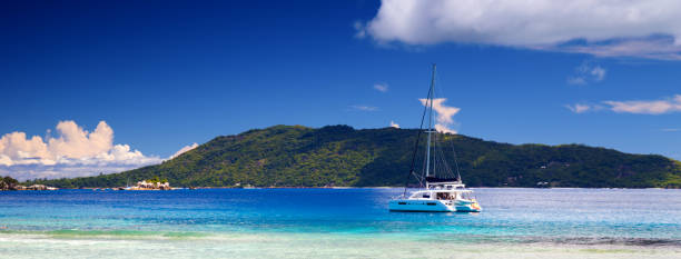 istock Catamaran near Big Sister and La Digue 1082518364