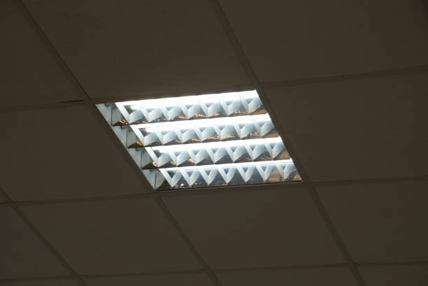 istock glowing square chandelier with bulbs on the gray ceiling 1082519560
