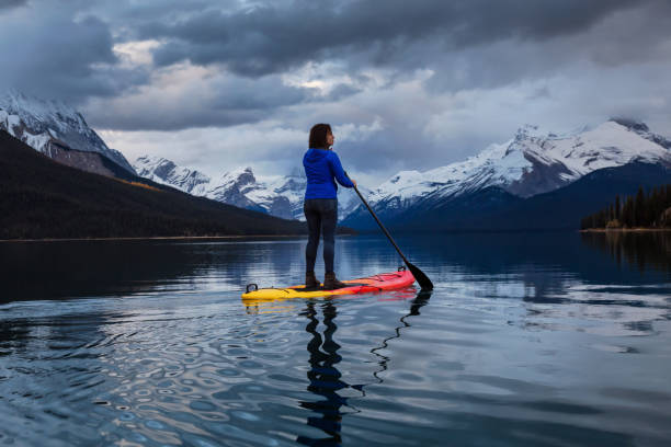 istock Girl Kayaking during Sunset 1082536378