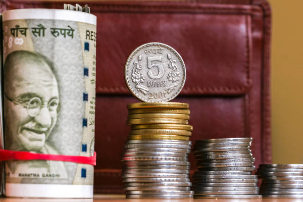 Indian currency notes of 500 denomination and 10 denomination coins