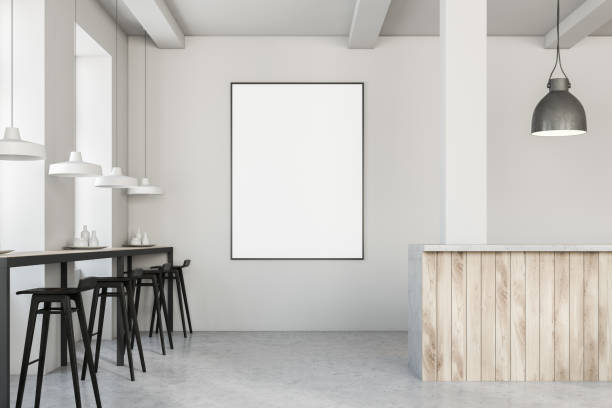 istock White cafe with black stools, poster and bar 1082538464