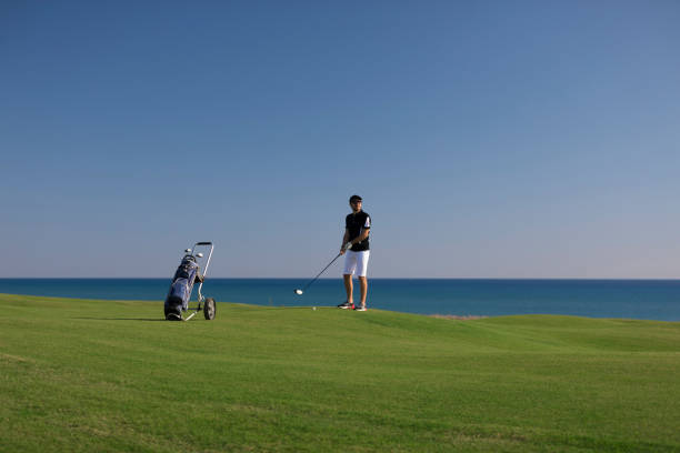 istock Golf player looking away at the hole for deciding on the shot - Links Golf 1082543804