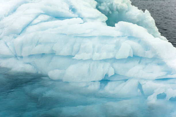 istock Massive Iceberg floating in Arctic Ocean in Greenland 1082546340