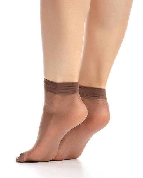 istock Female legs in mocha mocca nylon socks 1082548266