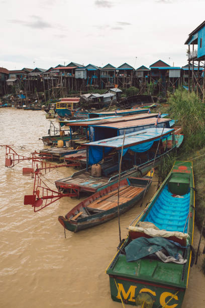 istock Boats Moored On Beach Against Sky 1082548826