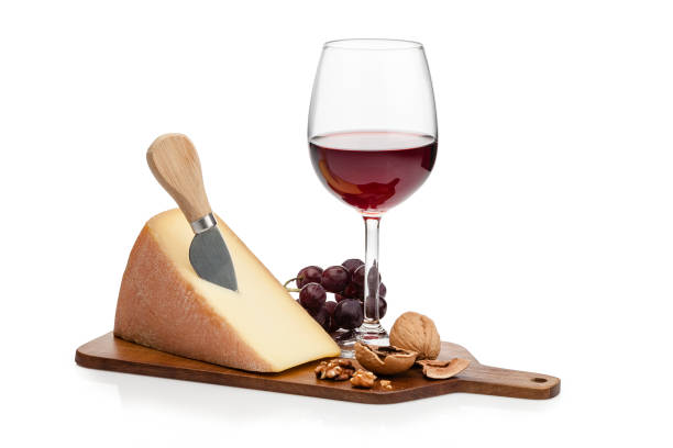 istock Cheese and wine platter isolated on white background 1082549800
