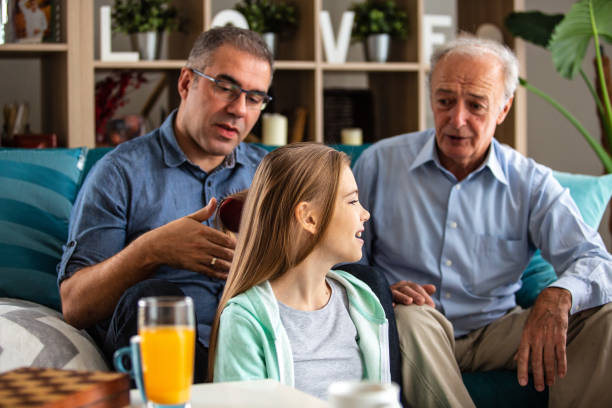 istock Three generation family enjoying the day at home 1082557492