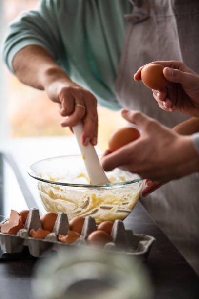istock Woman mixing batter in a bowl 1082557690