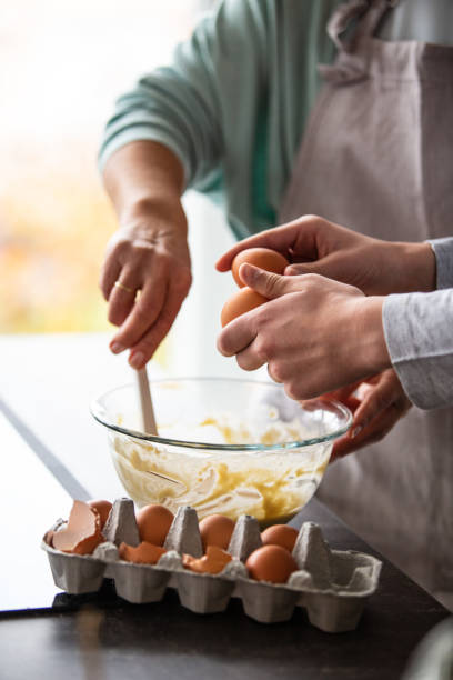 istock Woman mixing batter in a bowl 1082557704