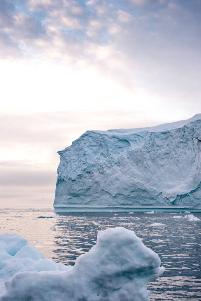 istock Massive Iceberg floating in Arctic Ocean in Greenland 1082558334