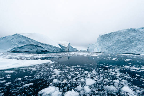 istock Massive Iceberg floating in Arctic Ocean in Greenland 1082562494