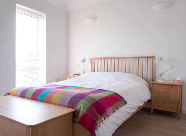 istock Minimalist, uncluttered bedroom interior 1082570520
