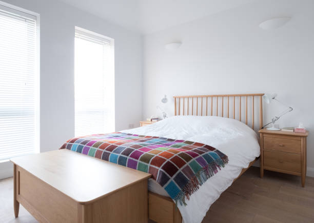 istock Minimalist, uncluttered bedroom interior 1082570784