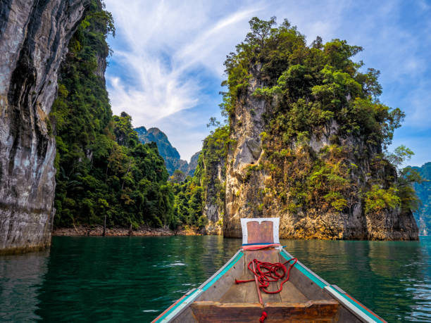 istock Natural lake with boat and mountains landscape 1082571526