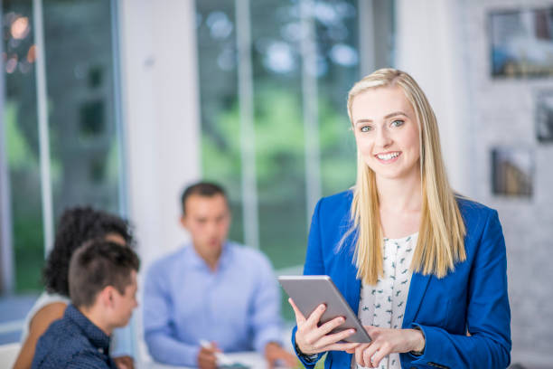 istock Businesswoman Holding Tablet 1082571884