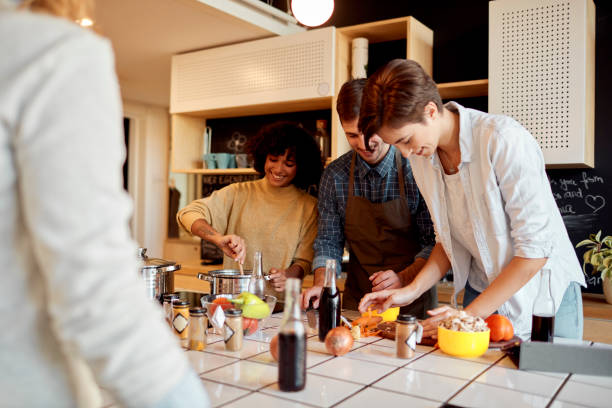 istock Friends Cooking Together 1082575326