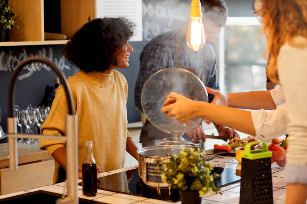 istock Friends Cooking Together 1082576836