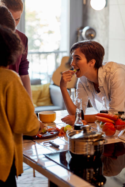istock Friends Cooking Together 1082576924