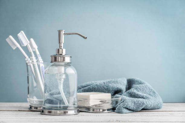 istock Bathroom set with toothbrushes, towels and soap 1082577112