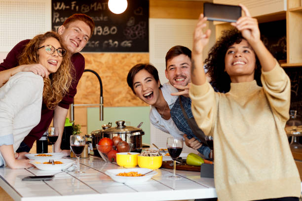 istock Friends Cooking Together 1082577138