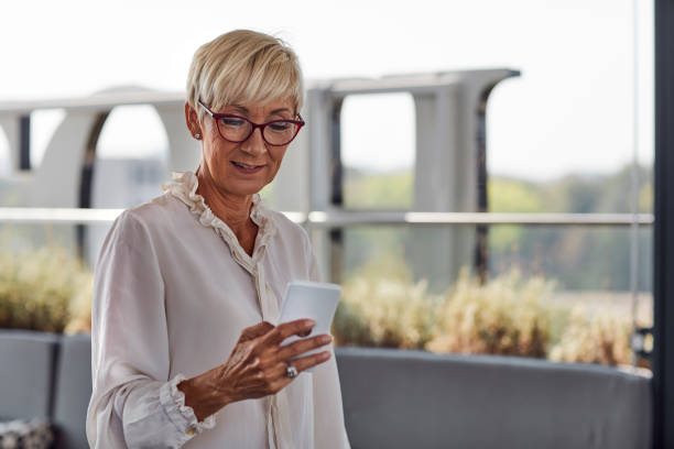 istock Senior Woman On A Rooftop Cafe 1082578092
