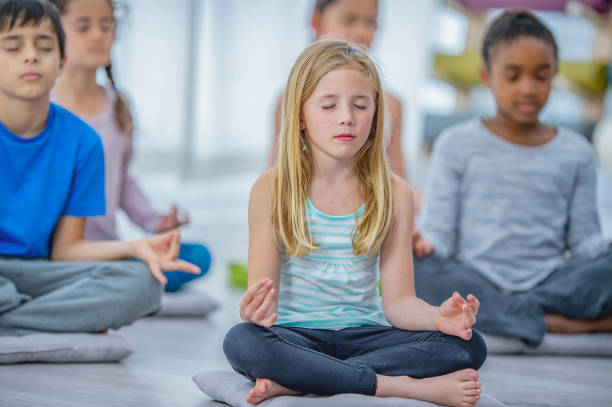 istock Children in yoga class 1082578300