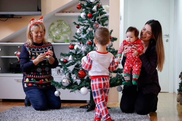 istock Family celebrating Christmas at home 1082585986