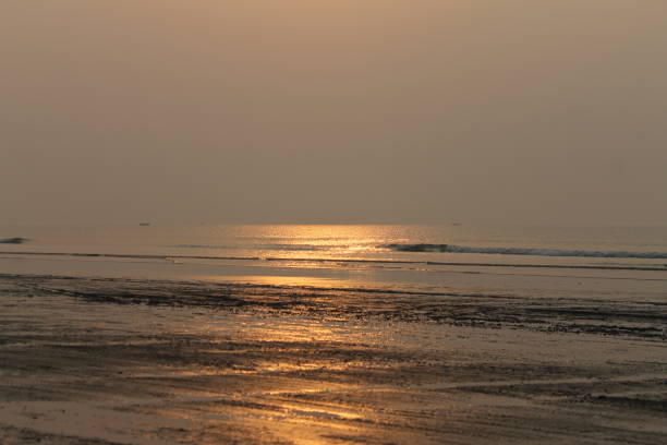 Sunrise on traveling for refreshing mind and soul apart from fun to the seashore Beach around Asia, India. Odisa, India, very popular in eastern India.\