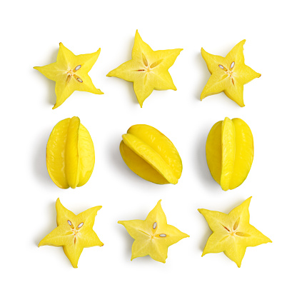 Fruit pattern. Ð¡arambola fruit (starfruit) slices isolated on white background