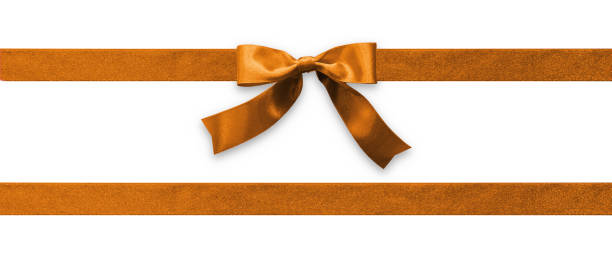 Copper gold bow ribbon band satin golden stripe fabric (isolated on white background with clipping path) for holiday gift box, wedding invitation, greeting card banner, present wrap design decoration ornament Copper gold bow ribbon band satin golden stripe fabric (isolated on white background with clipping path) for holiday gift box, wedding invitation, greeting card banner, present wrap design decoration ornament lace fastener photos stock pictures, royalty-free photos & images