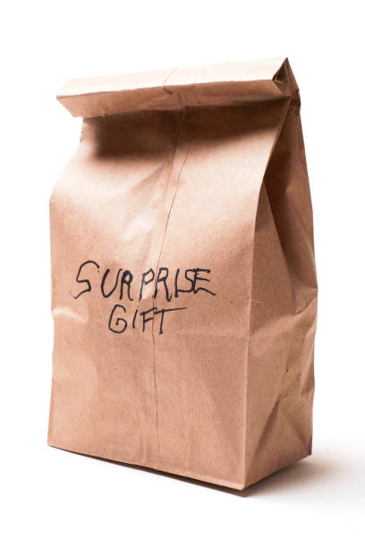 istock Paper Bag with text -SURPRISE GIFT 1082614758