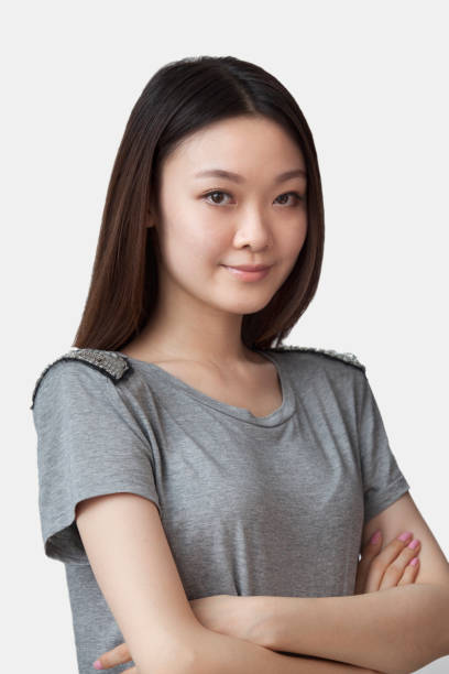 istock Chinese lady with arms crossed studio shot 1082622694