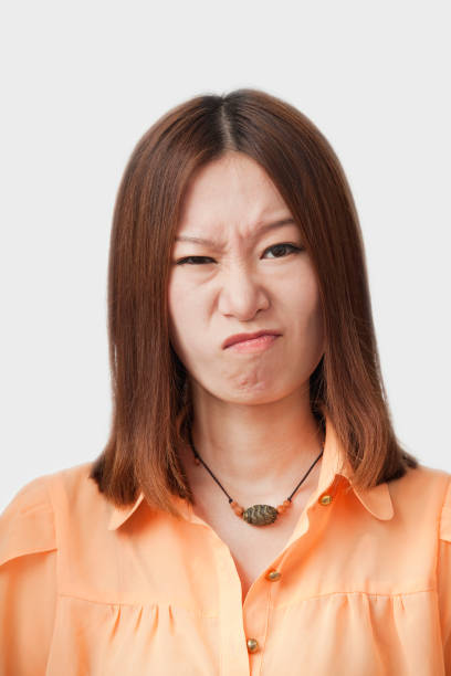 istock Frowning Chinese woman 1082623780