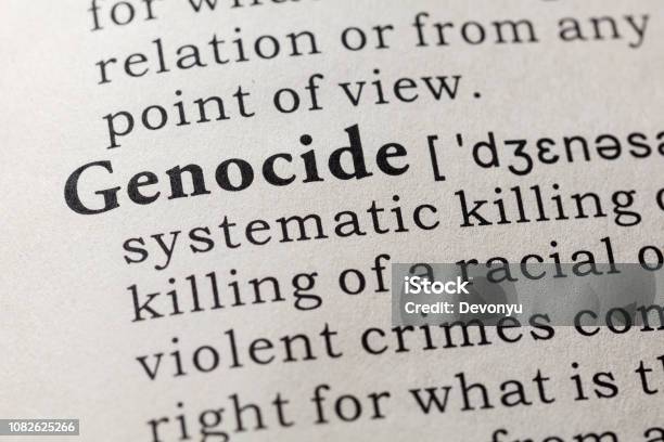 Definition Of Genocide Stock Photo - Download Image Now - Genocide, Dictionary, Mass Murder