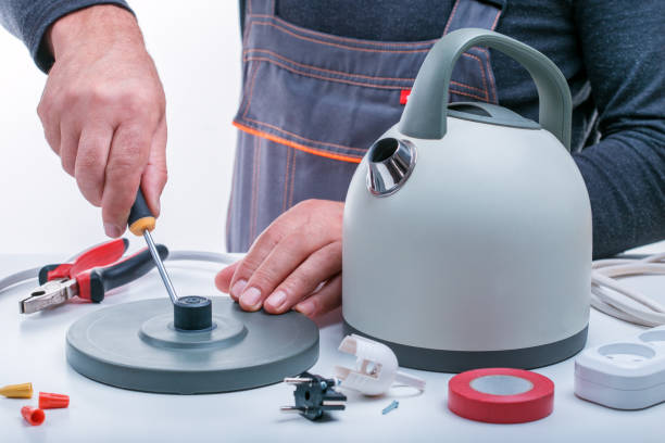 istock Mechanic repair appliances 1082633586