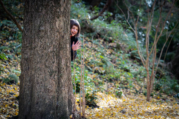 istock Young woman in autumn foliage 1082651550