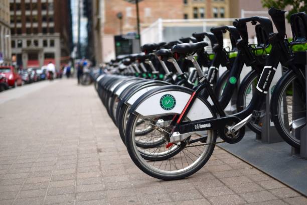 Toronto Bike Share rental bicycles Toronto, Canada - June 5, 2018: Toronto Bike Share rental bicycles lined up in downtown Toronto sustainable energy toronto stock pictures, royalty-free photos & images