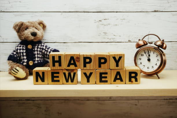 istock hapy new year alphabet letters on wooden background 1082653926