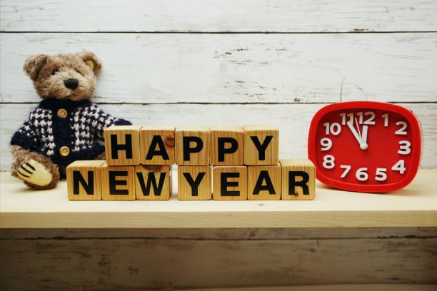 istock hapy new year alphabet letters on wooden background 1082653954