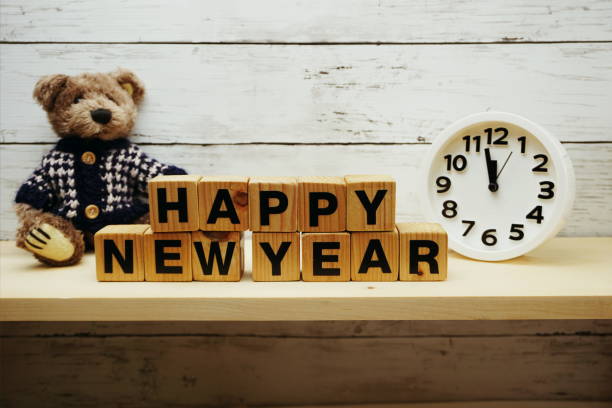 istock hapy new year alphabet letters on wooden background 1082666156