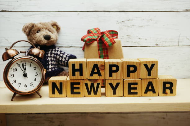 istock hapy new year alphabet letters on wooden background 1082666172